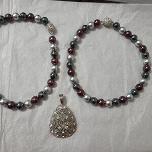 Three piece set with two connectable magnetic necklaces and the magnetic closure